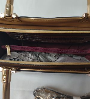 Lacquered handbag with animal print